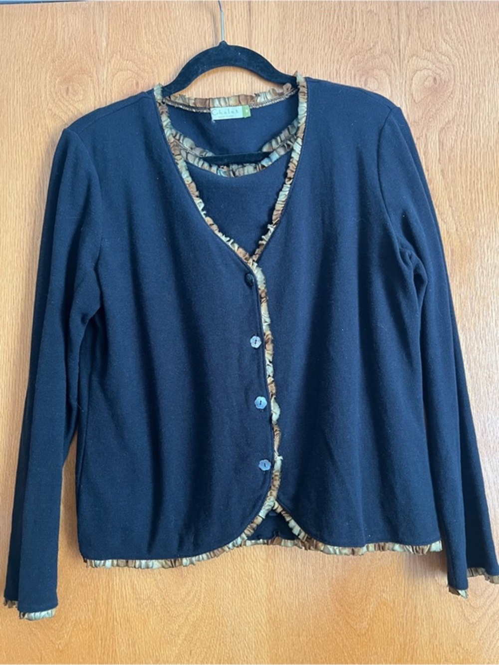 Chalet 2 piece waffle texture top with silk trim.  Size medium